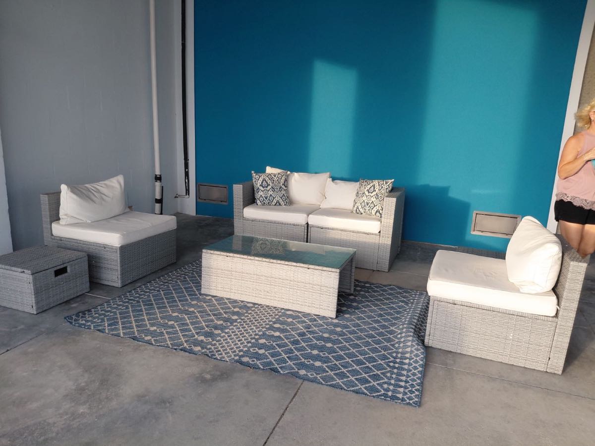 Covered lower-level seating area